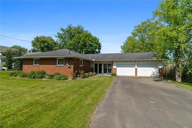 10756 Aldina Dr, Conneaut Lake, PA 16316 - ranch-style house with an attached garage, driveway, brick siding, and a front yard