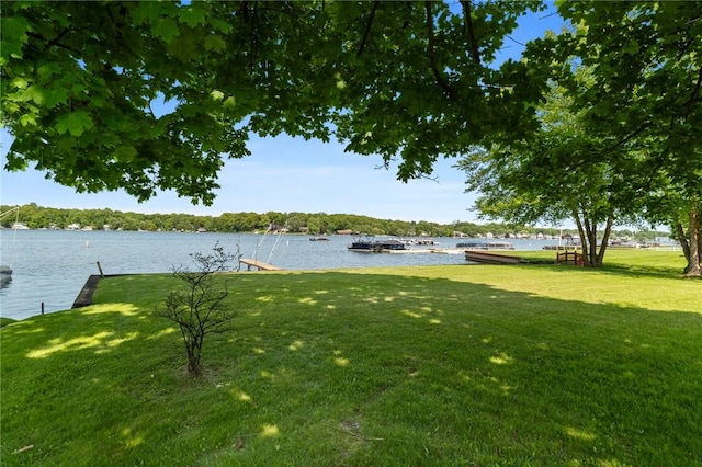 10756 Aldina Dr, Conneaut Lake, PA 16316 - view of green lawn featuring a water view and a boat dock