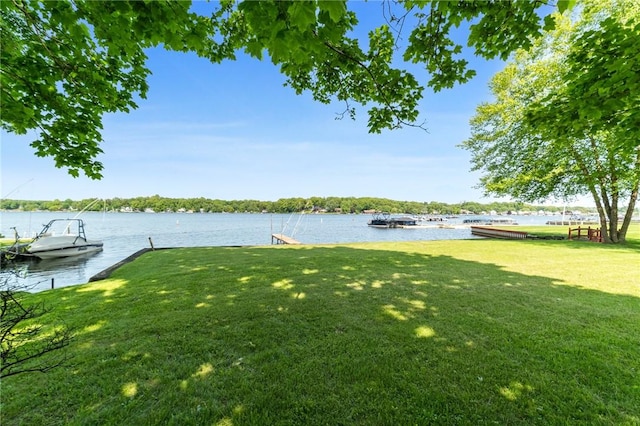 10756 Aldina Dr, Conneaut Lake, PA 16316 - view of grassy yard with a dock and a water view