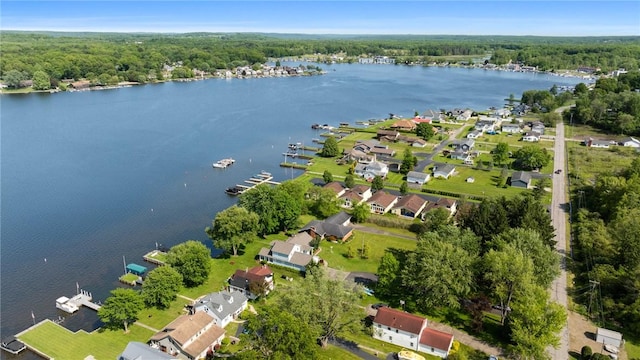 10756 Aldina Dr, Conneaut Lake, PA 16316 - aerial view of property's location featuring a nearby body of water, a heavily wooded area, and nearby suburban area