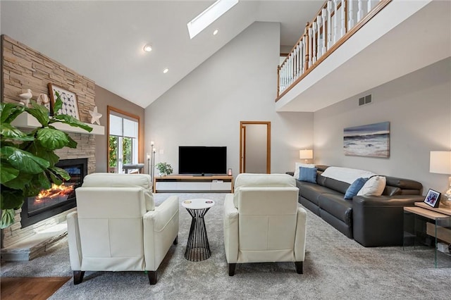3893 Windsor Ct, Hermitage, PA 16148 - carpeted living room featuring high vaulted ceiling, a fireplace, recessed lighting, and a skylight