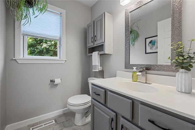 3893 Windsor Ct, Hermitage, PA 16148 - bathroom featuring baseboards, toilet, and vanity