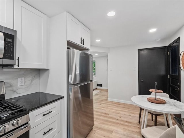 612 Blossom Dr, Baldwin Boro, PA 15236 - kitchen featuring appliances with stainless steel finishes, recessed lighting, light wood-style floors, backsplash, and white cabinetry
