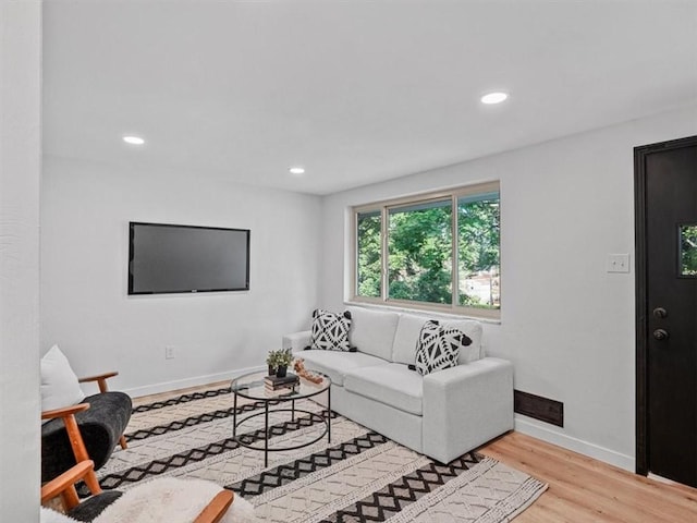 612 Blossom Dr, Baldwin Boro, PA 15236 - living area with light wood-type flooring, recessed lighting, and baseboards