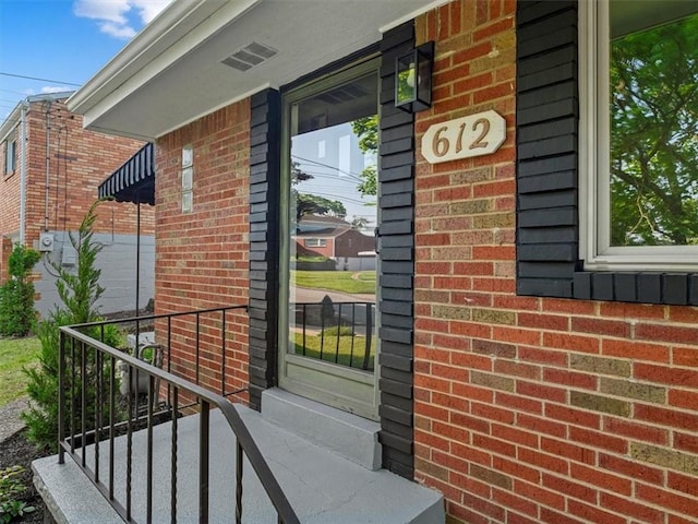 612 Blossom Dr, Baldwin Boro, PA 15236 - property entrance featuring brick siding