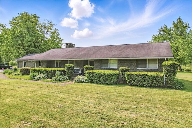 1011 S Lake Rd, Jefferson Twp Mer, PA 16137 - ranch-style house featuring a front yard, brick siding, and a chimney