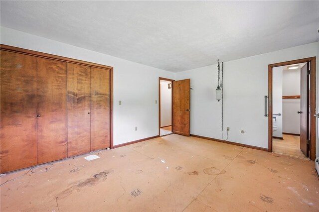 1011 S Lake Rd, Jefferson Twp Mer, PA 16137 - unfurnished bedroom with baseboards and ensuite bathroom