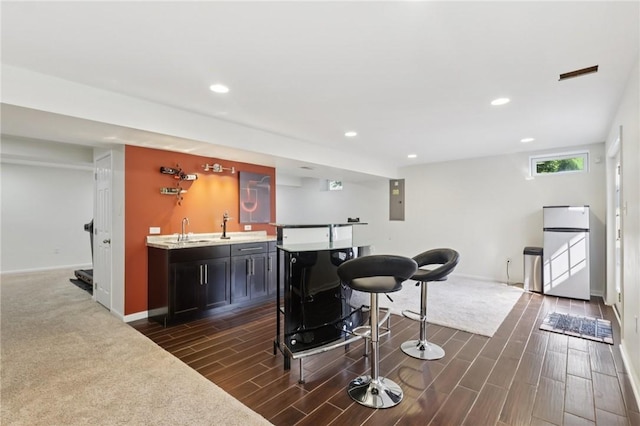 4324 Grandview Dr, Richland, PA 15044 - indoor wet bar with electric panel, recessed lighting, refrigerator, baseboards, and dark wood finished floors