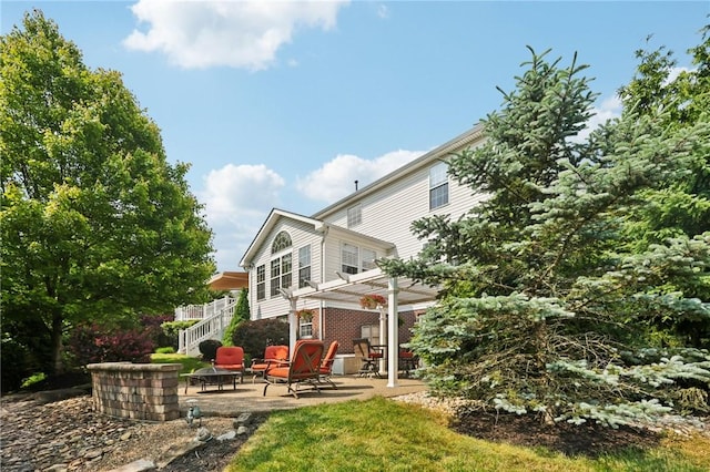 4324 Grandview Dr, Richland, PA 15044 - back of property with a patio, an outdoor fire pit, and stairway