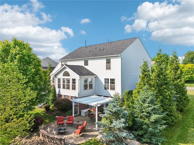 4324 Grandview Dr, Richland, PA 15044 - rear view of house with an outdoor fire pit, a patio area, and a shingled roof