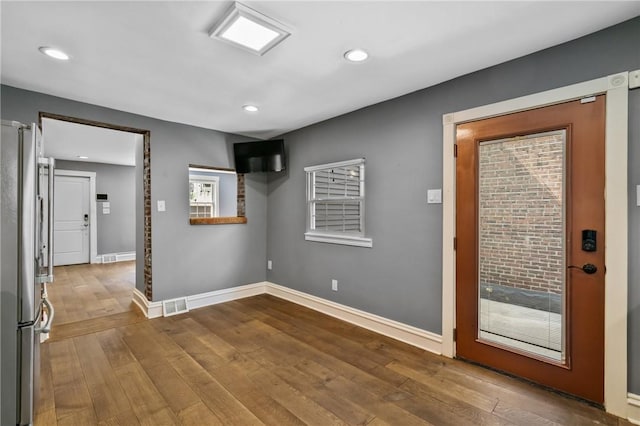 4825 Hatfield St, Lawrenceville, PA 15201 - foyer with baseboards, wood-type flooring, and recessed lighting