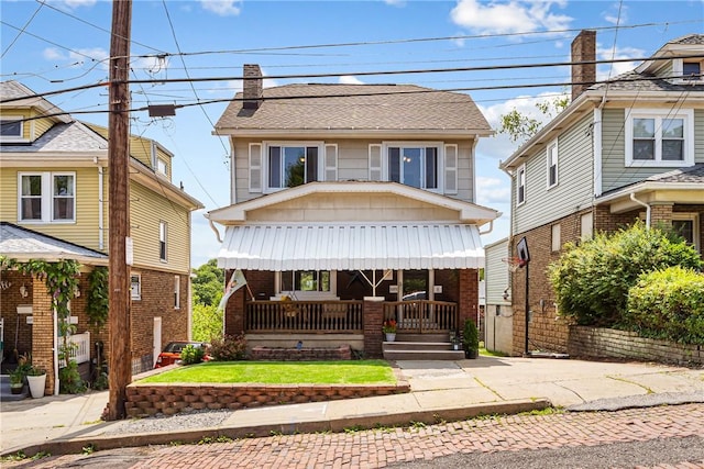 2693 Crosby Ave, Dormont, PA 15216 - view of front of house with covered porch, brick siding, and board and batten siding