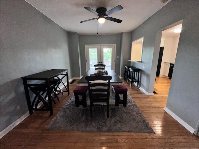 2693 Crosby Ave, Dormont, PA 15216 - dining room featuring wood-type flooring, french doors, ceiling fan, and baseboards