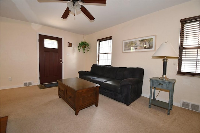 21 Leon Rd, Green Tree, PA 15220 - living area with light colored carpet, a ceiling fan, and baseboards