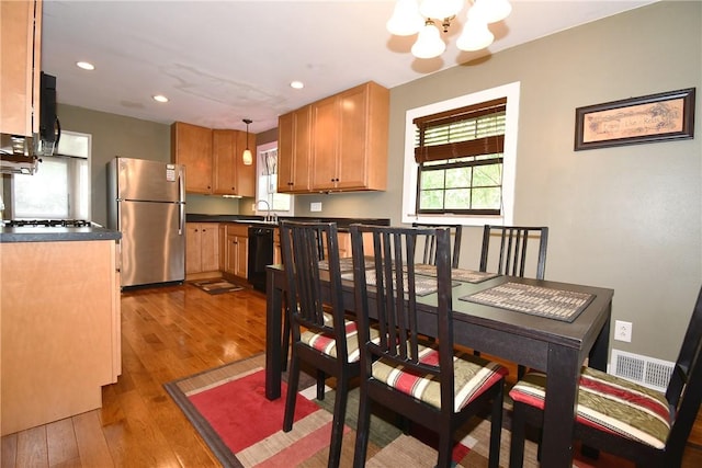 21 Leon Rd, Green Tree, PA 15220 - dining room with a chandelier, dark wood finished floors, and recessed lighting