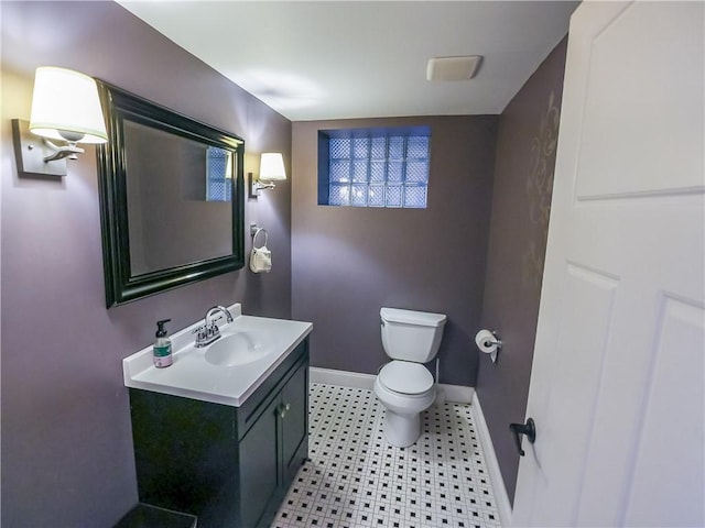 464 Avon Dr, Mt Lebanon, PA 15228 - half bathroom featuring vanity, toilet, and baseboards