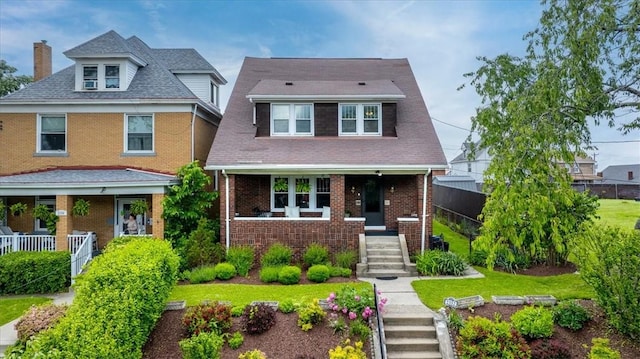 2352 Beaufort Ave, Brookline, PA 15226 - view of front facade with covered porch, a chimney, brick siding, and stairs