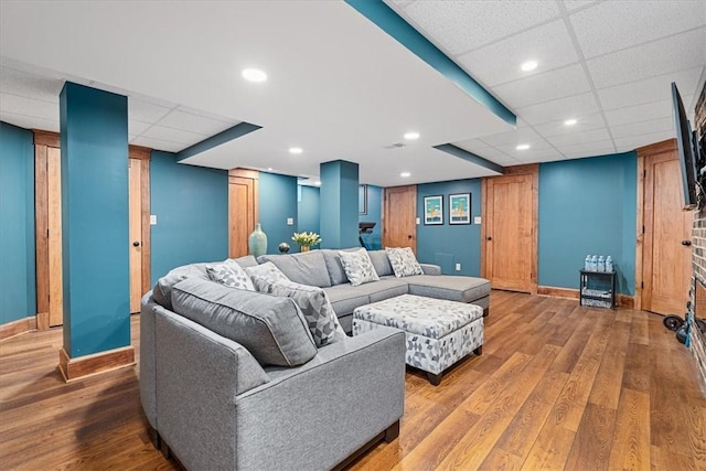 2352 Beaufort Ave, Brookline, PA 15226 - living room with wood finished floors, baseboards, and a paneled ceiling