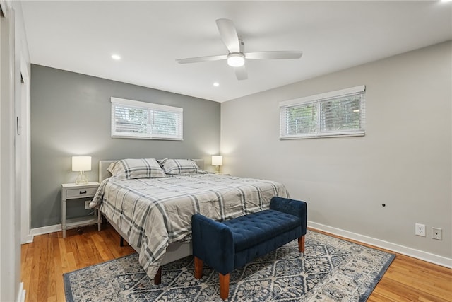 1450 Mohican Dr, Mt Lebanon, PA 15228 - bedroom featuring multiple windows, baseboards, wood finished floors, recessed lighting, and ceiling fan