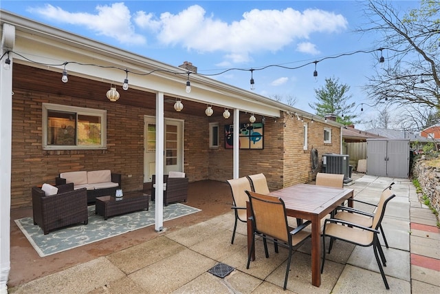 1450 Mohican Dr, Mt Lebanon, PA 15228 - view of patio featuring an outdoor hangout area, central AC unit, and outdoor dining area