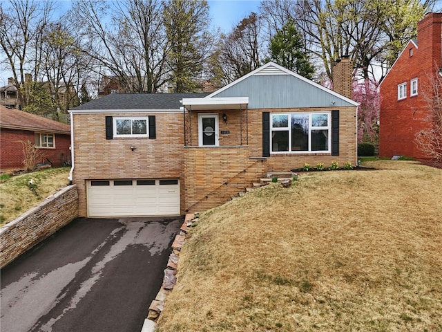 1450 Mohican Dr, Mt Lebanon, PA 15228 - ranch-style home with a garage, driveway, a front lawn, a chimney, and brick siding