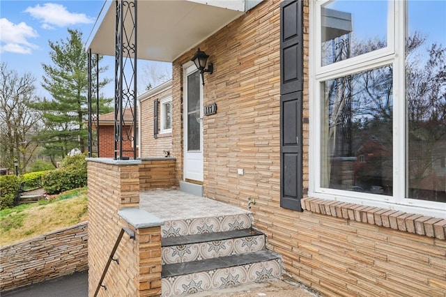 1450 Mohican Dr, Mt Lebanon, PA 15228 - view of exterior entry with a porch and brick siding
