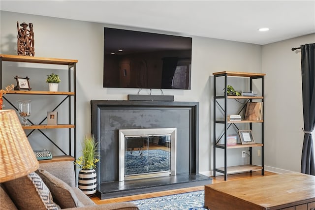 1450 Mohican Dr, Mt Lebanon, PA 15228 - detailed view of wood finished floors, a glass covered fireplace, and recessed lighting