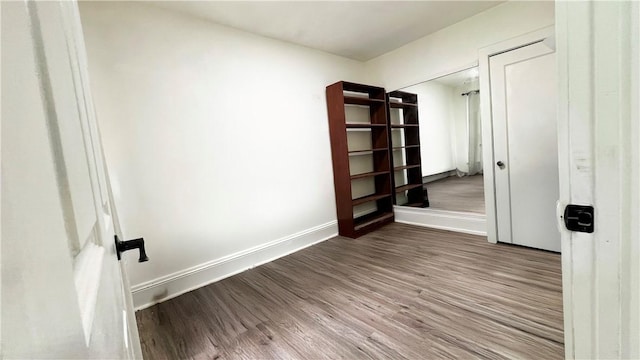 5427 Bartlett St, Squirrel Hill, PA 15217 - spare room with wood finished floors and baseboards