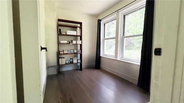 5427 Bartlett St, Squirrel Hill, PA 15217 - empty room with wood finished floors and baseboards