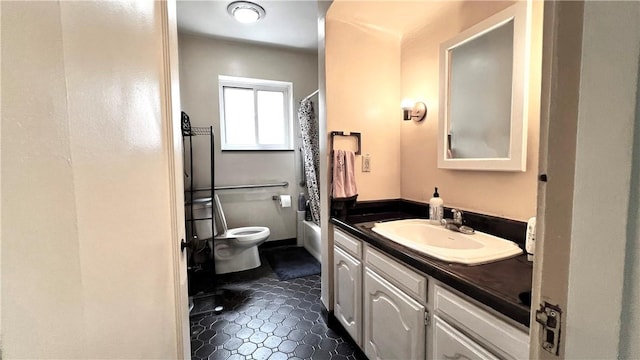 5427 Bartlett St, Squirrel Hill, PA 15217 - bathroom with vanity, toilet, shower / bath combo with shower curtain, and tile patterned flooring
