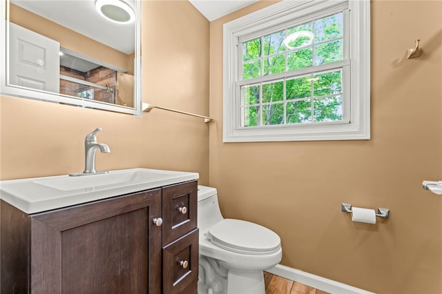 5360 California Ave, Bethel Park, PA 15102 - bathroom featuring toilet, vanity, and baseboards