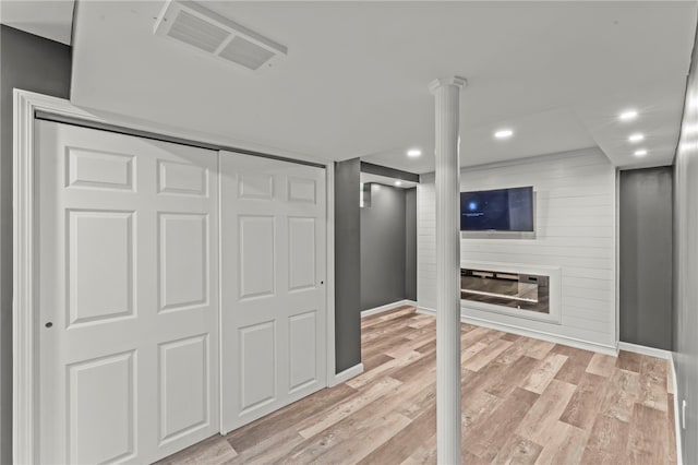 5360 California Ave, Bethel Park, PA 15102 - finished basement with baseboards, light wood-style floors, recessed lighting, and a large fireplace