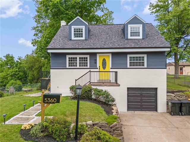 5360 California Ave, Bethel Park, PA 15102 - view of front of home with a garage, driveway, brick siding, a chimney, and roof with shingles