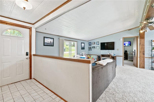 4041 Second St, Hempfield Twp Wml, PA 15642 - foyer with ceiling fan, vaulted ceiling, light tile patterned floors, and crown molding