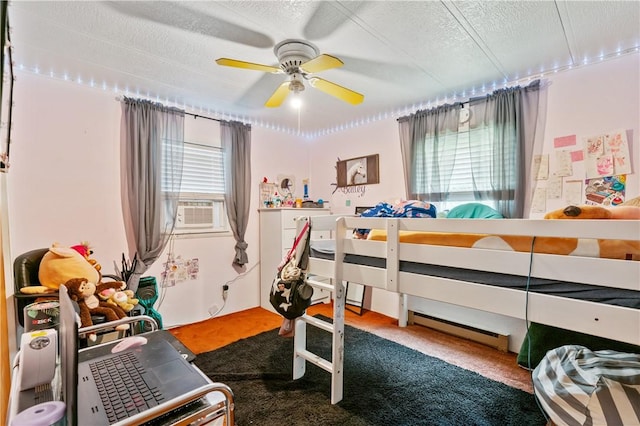 4041 Second St, Hempfield Twp Wml, PA 15642 - bedroom featuring a textured ceiling, cooling unit, carpet floors, and a ceiling fan