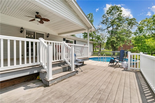4041 Second St, Hempfield Twp Wml, PA 15642 - wooden terrace featuring ceiling fan and an outdoor pool