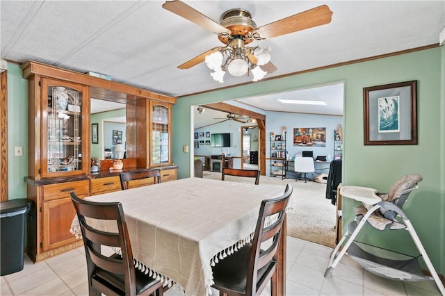 4041 Second St, Hempfield Twp Wml, PA 15642 - dining area featuring a ceiling fan, light tile patterned flooring, crown molding, a skylight, and light carpet