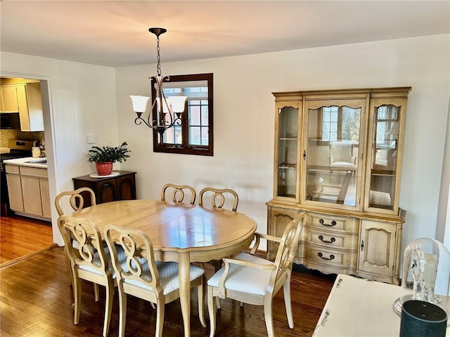 114 Tillotson Cir, Ross Twp, PA 15237 - dining room featuring a chandelier and dark wood finished floors
