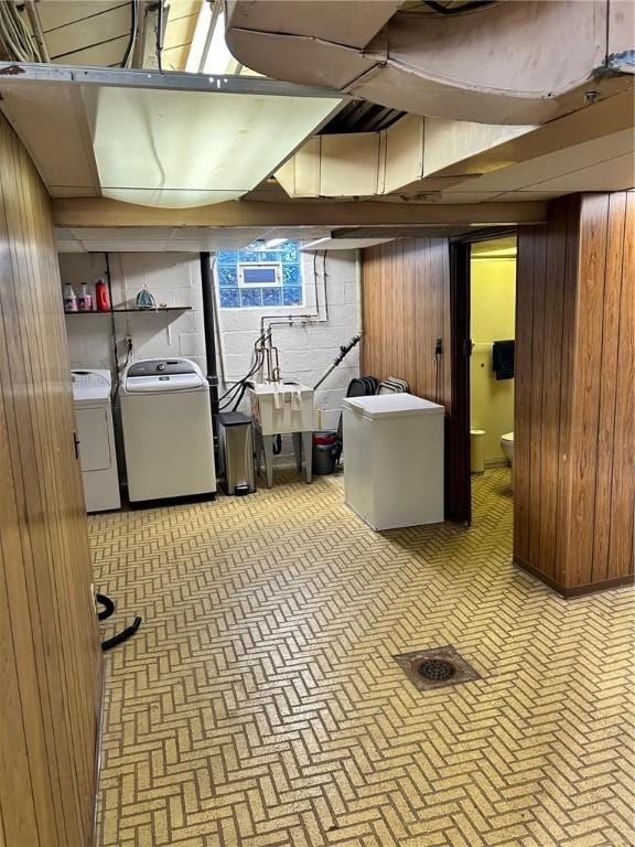 114 Tillotson Cir, Ross Twp, PA 15237 - basement with washer and dryer, wood walls, and concrete block wall