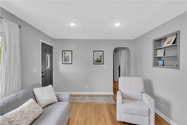 310 Hutter Ave, North Sewickley Twp, PA 16117 - living area featuring arched walkways, light wood-style flooring, baseboards, and recessed lighting