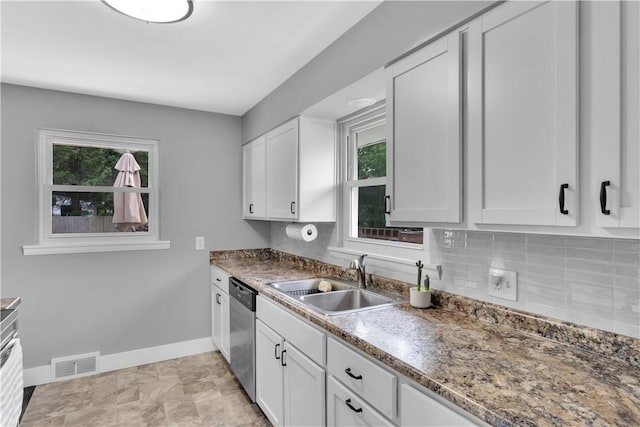 310 Hutter Ave, North Sewickley Twp, PA 16117 - kitchen featuring baseboards, a sink, dishwasher, and white cabinets