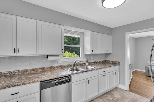 310 Hutter Ave, North Sewickley Twp, PA 16117 - kitchen featuring dishwasher, a sink, white cabinets, and decorative backsplash