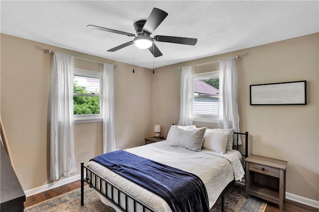 310 Hutter Ave, North Sewickley Twp, PA 16117 - bedroom featuring dark wood finished floors, baseboards, and ceiling fan