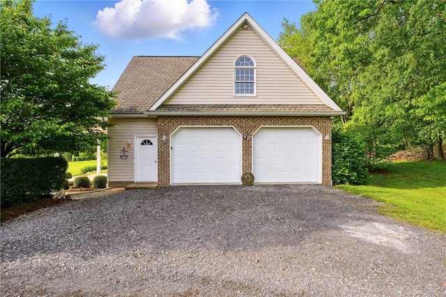79 Mariacher Rd, Findley Twp, PA 16137 - view of front facade with brick siding and a shingled roof