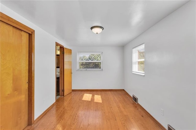 427 Cedar St, Jeannette, PA 15644 - unfurnished bedroom with light wood-type flooring and baseboards