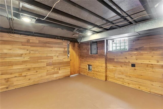 427 Cedar St, Jeannette, PA 15644 - basement featuring wood walls and electric panel