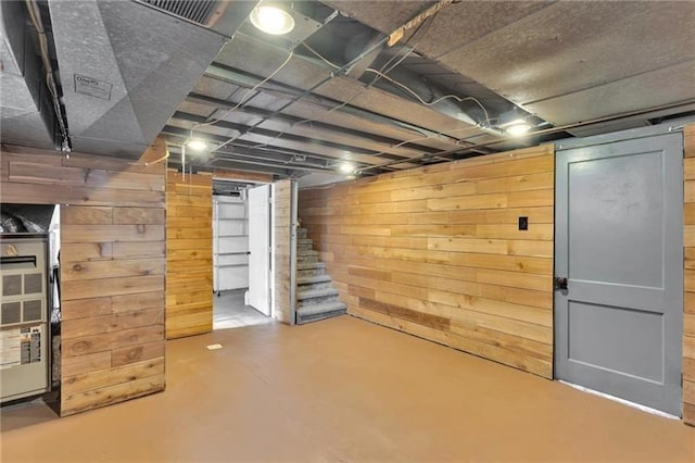 427 Cedar St, Jeannette, PA 15644 - unfinished below grade area featuring wood walls and stairs