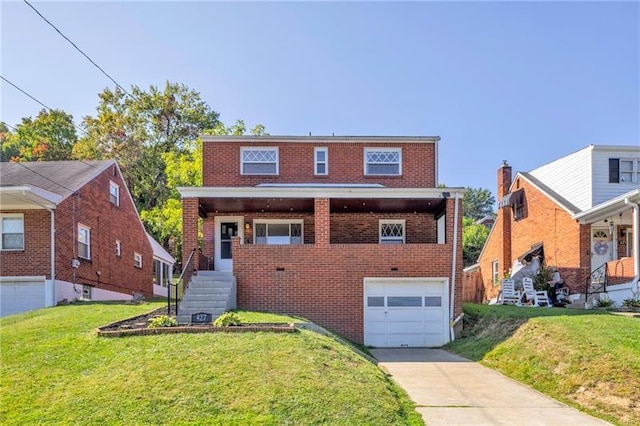 427 Cedar St, Jeannette, PA 15644 - view of front of home featuring brick siding, driveway, a garage, and a front yard