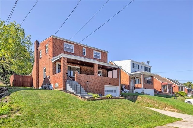 427 Cedar St, Jeannette, PA 15644 - view of front of home featuring brick siding, a front lawn, and a chimney