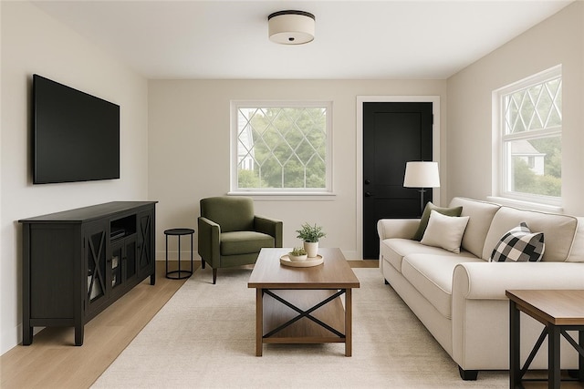 427 Cedar St, Jeannette, PA 15644 - living room featuring plenty of natural light and light wood-style floors